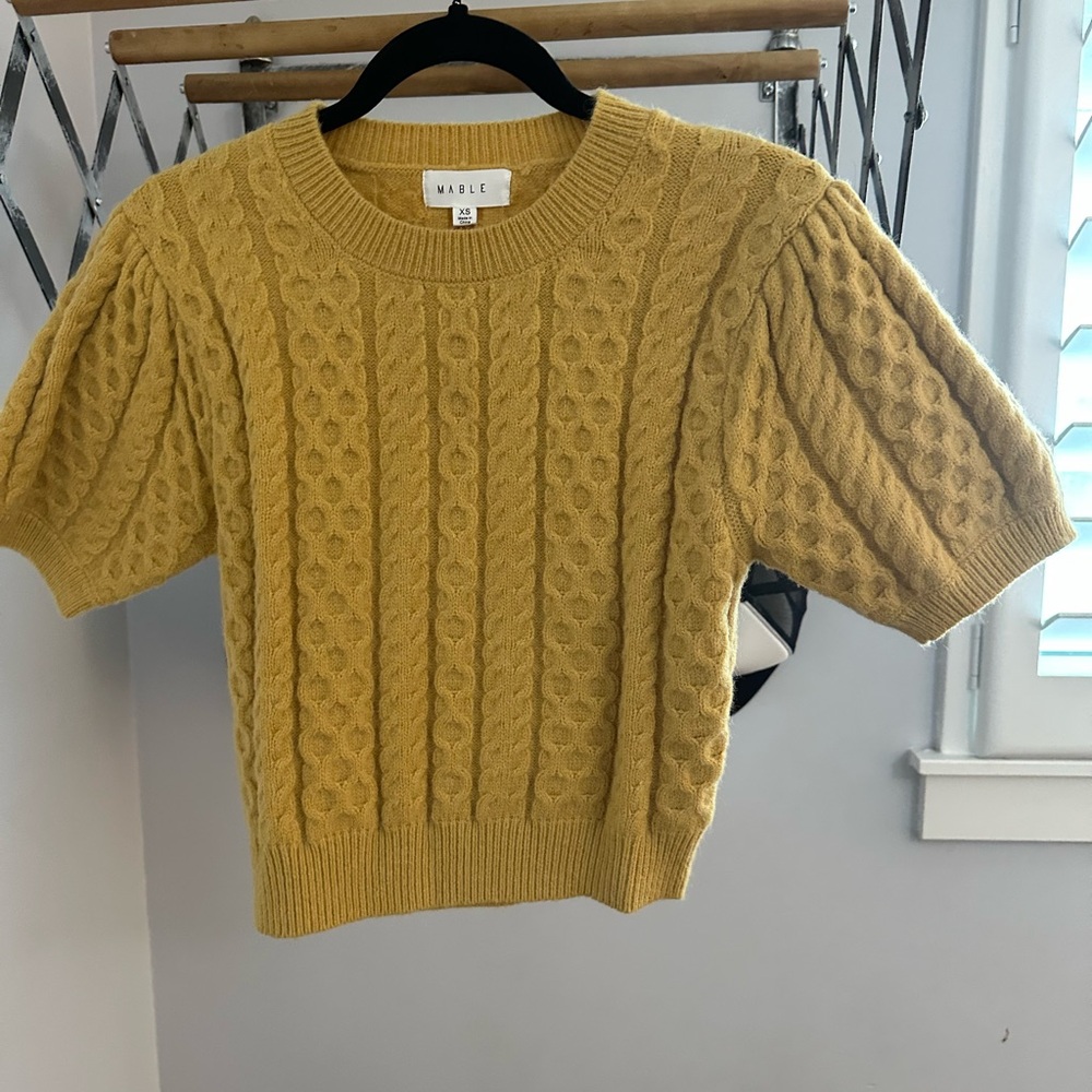 Cute mustard yellow sweater. Cable knit. Short sleeve.